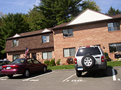 A parking lot with cars parked in it