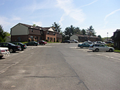 A parking lot with cars parked in it.