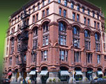 A large building with many windows and balconies.