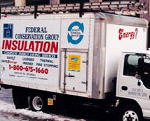 A truck parked on the side of a road.