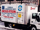 A truck parked on the side of a road.